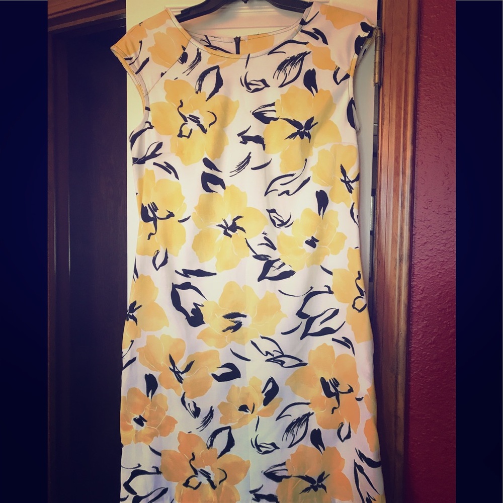 Dress in yellow and black floral print, + pockets!